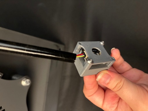 Sensor wire connected to the magnetic temperature sensor